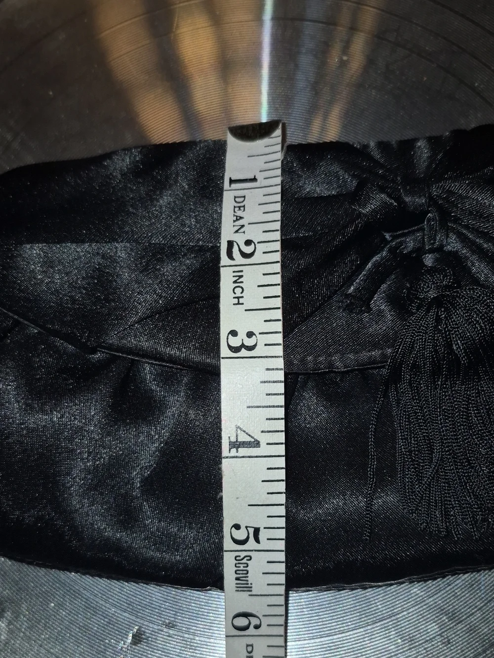 Vintage: A black satin foldover evening bag. Satin Bow& Rusch Pleating &tassels